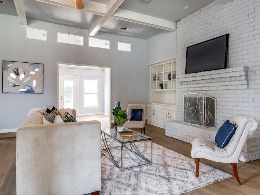 MAJOR PRICE IMPROVEMENT, Motivated Sellers! Lovely Dallas home on almost a quarter acre with Richardson ISD schools. 1 story, 3094 sq ft with 4 bedrooms, 3 bathrooms, 3 living areas, 2 dining areas, wet bar and open floorplan. Enter to the enormous family roof with beautiful coffered ceilings, painted brick fireplace and built ins, as well as wet bar. Formal dining room attached and there is both a second living room and a sunroom or playroom right off the main living area. The kitchen has been updated and features double ovens, granite counters, subway tile and wine cooler. Large breakfast area with window seat and laundry area, pantry and full bath nearby. LVP throughout. The mstr suite has room for a sitting area and the mstr bath is massive, bright and has dual closets and vanities as well as separate shower and soaking tub. The 3 additional bedrooms share a jack n jill bath. The backyard is gorgeous with big trees and tons of room and privacy. Great schools and location!