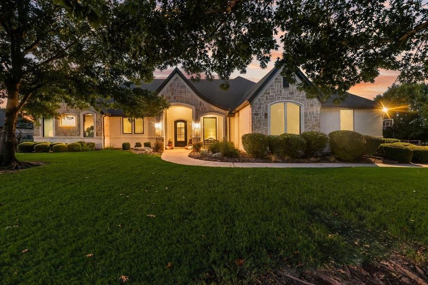 Located in the prestigious Hills of Argyle sits this beautiful newly renovated home on 1.3 acres! Argyle Schools District- Hilltop Elementary and smaller High School Zone for 2027.   This home boasts approximately 4100 square feet of extraordinary design with designer finishes throughout!   The home was completely remodeled in 2024-2025 including:  
Complete pool reconstruction, new plaster, new tile and coping, new travertine decking, new pool equipment, Outdoor kitchen and pergola;   All new RAM windows and two new slider door systems, New iron front door,  Complete remodel in master bathroom, tub, shower, sink, toilets, tile, lighting, hardware and all plumbing fixtures; New paint throughout entire house; Updated ceiling fans and can lights throughout; New cabinetry and built-ins in girls bedroom; Boys-new vanities, bathroom remodel, removed tub, and installed new shower and all plumbing fixtures; New cabinetry in living room entertainment, and wine storage cabinetry, New cabinetry in media room, New AV system, New carpet in media room, Updated electrical outlet covers and light switch plates.
This home sits at the end of a quiet cul-de-sac with access to walking trails to connect to community greenbelts.  Call today to schedule a showing.   Owner is a licensed real estate broker.