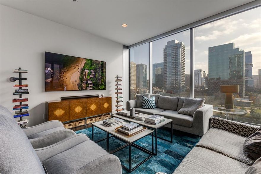 This stunning residence at Bleu Ciel offers a perfect blend of modern design and effortless luxury. Spanning 2,114 square feet, the home is filled with natural light from expansive floor-to-ceiling windows. The open-concept layout flows beautifully between the living, dining, and kitchen spaces, creating an ideal setting for both everyday living and entertaining. A wraparound terrace with a cozy fireplace extends your living space outdoors—perfect for relaxing evenings or hosting guests against a vibrant city backdrop.The gourmet kitchen is designed to impress, featuring sleek custom cabinetry, Miele appliances, and a spacious island for casual dining and gathering.Two generously sized primary suites provide peaceful retreats, each with spa-inspired bathrooms offering soaking tubs, walk-in showers, dual vanities, and custom closets. An additional bedroom with an en-suite bath adds comfort and flexibility for guests. This home includes a private 2-car garage and access to Bleu Ciel’s premier amenities: resort-style pool, spa with sauna, state-of-the-art fitness center, private yoga studio, wine room, valet service, and 24-hour concierge. Experience refined high-rise living in one of the city’s most desirable communities.