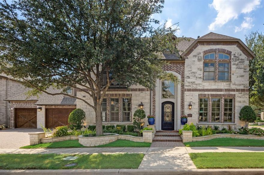 Welcome to this stunning stone and brick residence offering 5 bedrooms, 4.5 baths, and multiple living spaces all designed for both everyday comfort and elegant entertaining. Step inside to a soaring foyer and expansive open-concept living room highlighted by a floor-to-ceiling stone fireplace, abundant natural light, and views of the backyard oasis. The gourmet kitchen is a chef’s dream with granite counters, custom cabinetry, double ovens, Wolf gas range with pot filler, built-in Sub-Zero refrigerator, and an oversized island that anchors the heart of the home. A formal dining room with rich navy walls provides a sophisticated backdrop for dinner parties and gatherings. The private owner’s retreat on the main level boasts a serene spa-inspired bath with dual vanities, soaking tub, and walk-in shower. One additional bedroom and full bath is downstairs and upstairs you will find two additional bedrooms, beautifully finished baths, a loft-style game room with balcony access, and a dedicated media room perfect for movie nights. Step outside to your backyard paradise where a covered pergola with ceiling fan and water feature sets the stage for year-round entertaining. The covered patio offers plenty of room for lounging and relaxing. Located in the sought-after Avignon community, residents enjoy resort-style amenities including a clubhouse, pool, basketball courts, and walking trails. With its thoughtful design, elegant finishes, and inviting outdoor spaces, this home delivers both luxury and livability in one exceptional package.