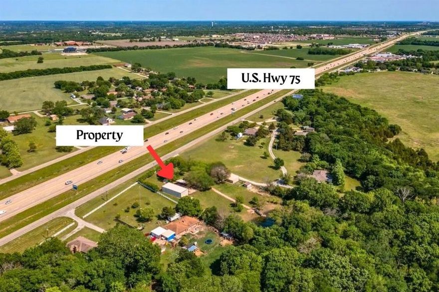 Rare opportunity on nearly 3 acres in fast-growing Grayson County, ideally positioned along US Hwy 75 in Van Alstyne—one of North Texas’ most active growth corridors between Dallas and Sherman. The property features a charming brick residence with a covered front porch, additional covered parking, and a small pond, offering peaceful rural living just minutes from expanding commercial development. Located outside city limits, this property offers flexibility for future commercial or mixed-use potential, while currently functioning as a comfortable residence. Strong highway frontage and visibility make this an attractive buy-and-hold opportunity—enjoy today as a homestead or rental, and develop later as the area continues its rapid growth. Surrounded by new residential and commercial expansion, this property sits in the path of progress with excellent access to Hwy 75. Ideal for investors, owner-users, or developers seeking land with immediate use and long-term upside. Buyer to verify zoning, permitted uses, and development potential.