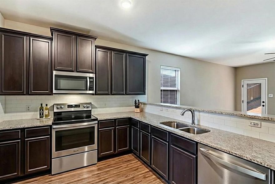 THE LOWEST PRICED HOME IN THE COMMUNITY WITH AN ASSUMABLE INTEREST RATE OF 4.375%, A NEW ROOF, PLUS NO MUD OR PID TAXES SAVING YOU HUNDREDS PER MONTH AND THOUSANDS YEARLY. Welcome to one of the best opportunities in the community this move-in ready 3-bedroom, 2-bath home is strategically priced to stand out and deliver exceptional value in today’s competitive market. Ideally located just minutes from McKinney with quick access to US-75, you’ll enjoy everyday convenience to shopping, dining, and entertainment while still appreciating a peaceful neighborhood setting. Inside, the thoughtfully designed layout features a privately separated primary suite, creating a quiet retreat from the secondary bedrooms, along with an open-concept living space that feels both spacious and inviting. The living area flows seamlessly into a large backyard with a covered patio, offering the perfect setup for entertaining, relaxing, or enjoying outdoor living year-round. What truly sets this home apart is the  long-term financial benefits, including a brand new roof already completed and no MUD or PID taxes—saving you hundreds per month and thousands over the life of your loan compared to many nearby homes and new construction options. With comfort, functionality, and built-in savings, this home delivers unmatched value and is an opportunity you don’t want to miss.