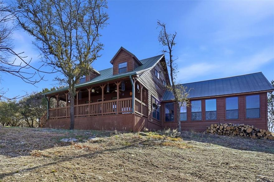 Are you looking for a community in the country? A community filled with scenic views, lakes, and wildlife? Then look no more and welcome to your new home! Down to earth luxury, peacefully situated.  A perfect home for those who want acreage, amenities and all that Mountain Lakes Ranch has to offer. 5-acre property comes with a gazebo, storage shed, wildlife observatory and large covered deck with ceiling fans, perfect for enjoying nature. The heart of the home is spacious, bright, ideal for gatherings. Hardwood laminate flooring welcomes you throughout the open floor plan. Cedar accents throughout the home give it a real lodge or western feel. Classic white shaker cabinets, stainless steel appliances, a big kitchen island add a modern update to the rustic feel. Vaulted ceilings and built in shelving give the primary bedroom an extra touch of elegance, the rolling library ladder adds a touch of old world craftmanship. The 4 windows in the primary bedroom provide a scenic overlook of the property and a peaceful escape from city life. The back porch makes a wonderful retreat to relax and reflect. Property includes 2 large outbuildings that can be used for multi-purpose. The Gazebo is nestled under the trees and provides a great place to gather. Stay warm and dry in the wildfire observatory- deer blind while observing the wildlife. The utility room off the kitchen has a built in doggie door to the fenced front yard, providing a safe and effective way to care for your pets. All Measurements and dimensions are approximate and deemed to be reliable, but are not guaranteed, and should be verified by the buyer. (Property Includes gazebo, picnic table, browning smoker, wildlife observatory- deer blind). American Home Shield warranty is  transferrable. Additionally there is a transferrable Aerobic Septic Service Contract valid through Jan 2027.