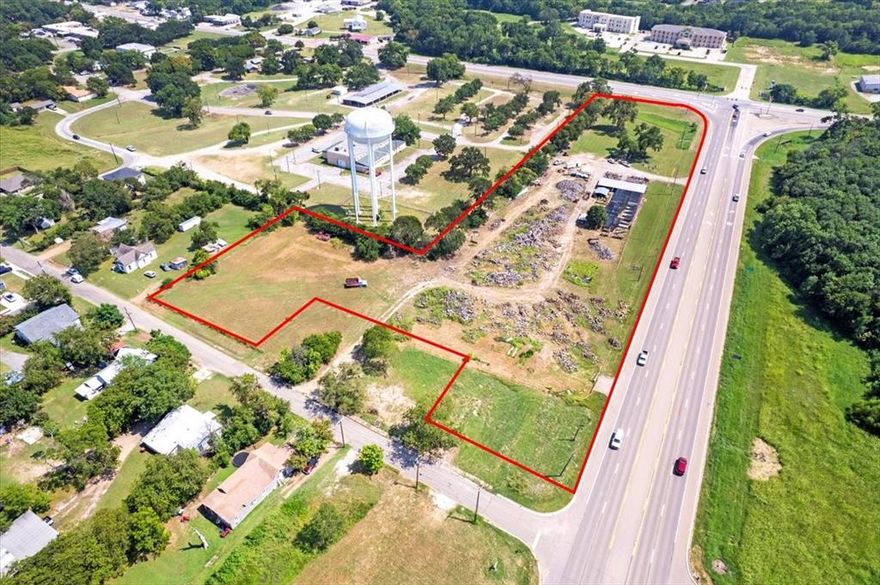 Situated in a prime location within the vibrant City of Bonham, Texas, this property is located at the intersection of Highway 121 and Highway 56 (W. Sam Rayburn Drive), extending all the way to W. 7th Street. This intersection ranks among the busiest in the county and is strategically positioned in a critical growth area. The majority of the growth is occurring along this corridor with major franchises popping up everywhere. If excellent exposure and easy access is what you are looking for, this property is it. Road frontage on three sides, (Hwy. 121, Hwy. 56 and W 7th Street) allows for many potential uses and opportunities. Bonham is conveniently located approximately 33 miles from Paris, 27 miles to Sherman, 10 miles to the Texas-Oklahoma Stateline, and an hour from the Dallas-Ft. Worth Metroplex.