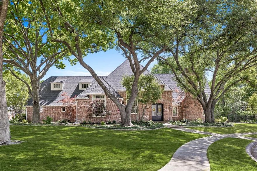 Exquisite cul-de-sac corner lot in The Estates of Gleneagles that will blow you away with all the luxury features and updates! Formal living boasts vaulted ceilings, walls of windows, built-ins, elegant marble fireplace, and convenient patio access. Airy dining room offers stylish chandelier and dramatic vaulted ceilings for extra ambiance. Spacious family room is illuminated with walls of windows overlooking backyard oasis. Easy flow to kitchen makes for easy entertaining. Chic gourmet kitchen features generous marble countertop space, and enormous waterfall island that boasts 6-burner GE Monogram cooktop with griddle. Other amenities include built-ins, double ovens, warming drawer, Bosch dishwasher and SubZero refrigerator installed in 2024. Sunny breakfast nook features built-ins and stylish chandelier for warm atmosphere. Indulge in hotel-style living in primary suite featuring windows overlooking shimmering pool, doors to patio, and relaxing sitting area. Remote shades offer easy lighting and privacy options. Spa-like primary bath is true luxury, with heated marble flooring, dual vanities with abundant counter space, built-in beverage fridge, and oversized standing shower with bench, steam features, and dual heads. Walk-in closet also has heated flooring, built-ins, and cedar closet. Private upstairs study is split-level, creating natural sitting area with plenty of built-ins and windows. Additional bedrooms offer full baths, walk-in closets, and ample room for families. Rooms could be used as exercise space or additional study. Impressive backyard oasis offers heated diving pool, travertine deck, cozy firepit, and extra green space for play yard or putting green. Covered cabana is ideal for outdoor dining with built-in gas grill, refrigerator, custom lighting, and A-V wiring for entertainment. Extra features include Control 4 Media-Smart Home System, oversized lot with creek, 2 tankless water heaters, driveway gate, lighting in trees, and generous storage.