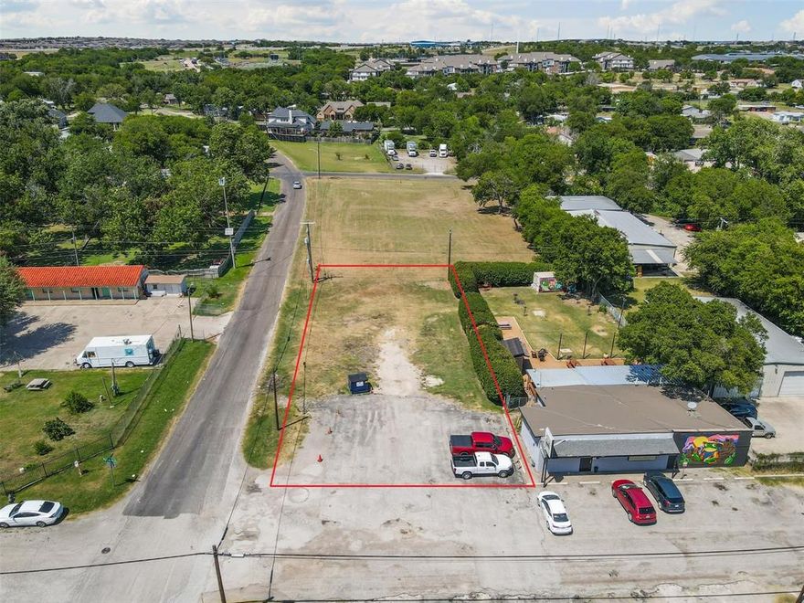 A premier corner lot with some asphalt and direct frontage on Camp Bowie West Blvd and Palo Alto Drive, offering maximum exposure. There is an Amazon facility just 2 minutes away—perfect for complementary or support businesses. Exceptional access—just off Loop 820 and minutes from I-30—for commuters, shoppers, and deliveries. Many large residential neighborhoods nearby, providing a built-in customer base and workforce. Whether you’re an investor, developer, or owner-user, this Fort Worth location checks the accessibility box in an area showing growth!