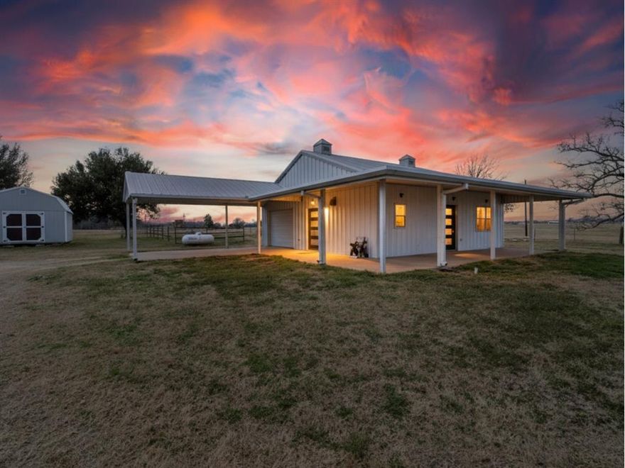 This 2-bedroom barndominium sits on approximately ±2 acres with a gravel driveway and well water, offering the freedom of country living without overwhelming upkeep. The home is equipped with gas heat, a propane oven, and a propane water heater — a practical setup for rural property.

Inside, you’ll find an open-concept layout with stained concrete floors, granite countertops, rich wood cabinetry, and a classic subway tile backsplash. The primary bedroom is conveniently located downstairs, making everyday living easy, while the second bedroom provides flexibility for guests, office space, or whatever fits your needs.

The bathroom features a walk-in tile shower with glass enclosure and custom niche — clean, modern, and functional.

Outside, the barn adds valuable versatility. Upstairs, there is an apartment space with a full bathroom. It does need some finishing work, but it offers additional square footage and flexibility for future use.

Located in Canton ISD, this property delivers usable acreage, functional improvements, and room to make it your own.

Country living — simplified.