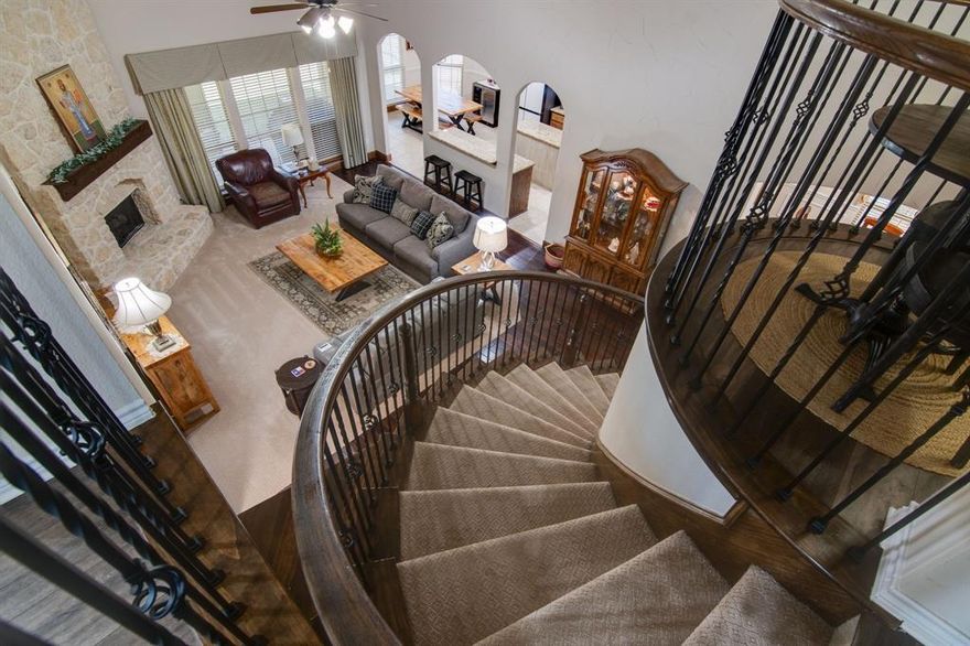 Seller is Offering a 2-1 Buydown on the rate (or) help with Buyer's closing costs.  Lovely two story First Texas Built home with high ceilings and stunning floor to ceiling stone gas fireplace, which is the focal point of the downstairs living room.  Large kitchen with gas cooktop, island, granite countertops, butler’s pantry or coffee bar and walk-in pantry.  Dining area with plenty of room for your dining table and china cabinet.  Private study with French doors in front of home on first floor.  Large owners retreat on first floor with huge luxury bathroom, separate vanities, jetted tub, separate shower, private toilet room, linen and walk-in closet.  Curved iron decorative railing staircase leads you to the second floor game room being used as exercise room, media room with raised flooring for theatre-like seating, pre-wired for sound with dry bar and mini fridge perfect for movie nights.  Four bedrooms on second floor with two full bathrooms, one being a Jack and Jill shared bath. Corner lot with side entry garage with storage closet has oversized space perfect for storage, shelving or workbench. Two entries into home from garage with one going through the laundry room and the other through the oversized mudroom with built-in bench, hooks for hang backpacks and or coats, and storage shelving.  Covered back patio with nice size fenced in backyard.  All windows and front door have solar screens to help with the energy efficiency of the home.  Built by First Texas Homes.