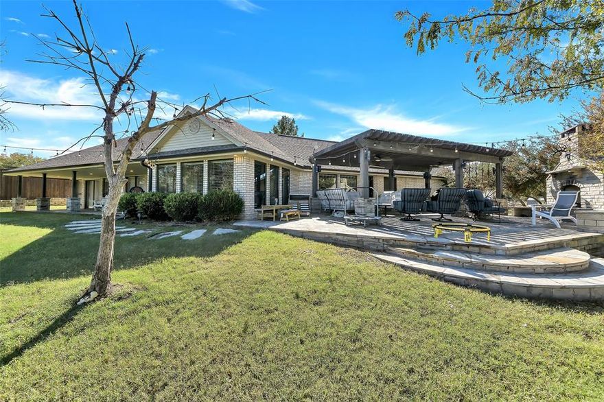 Discover this stunning waterfront property on the Peninsula in Graford, TX, offering the perfect blend of luxury and relaxation. This 3-bedroom, 2-bathroom home features a 3-car garage and boasts breathtaking lake views with a gentle slope leading to a nearby sandy beach. Enjoy lake life with a two-story deep-water dock, complete with a sun platform, Sea-Doo and boat lifts, and 2 EZ dock platforms. The outdoor spaces are equally impressive, with two outdoor living areas, a large pergola, and an outdoor kitchen, perfect for entertaining or unwinding as you take in the serene surroundings.
Inside, the home features an open floorplan adorned with custom wood floors, seamlessly blending style and functionality. This property is a dream come true for those seeking a peaceful retreat or a fun-filled lakeside escape. Don't miss the chance to make this Possum Kingdom gem your own!