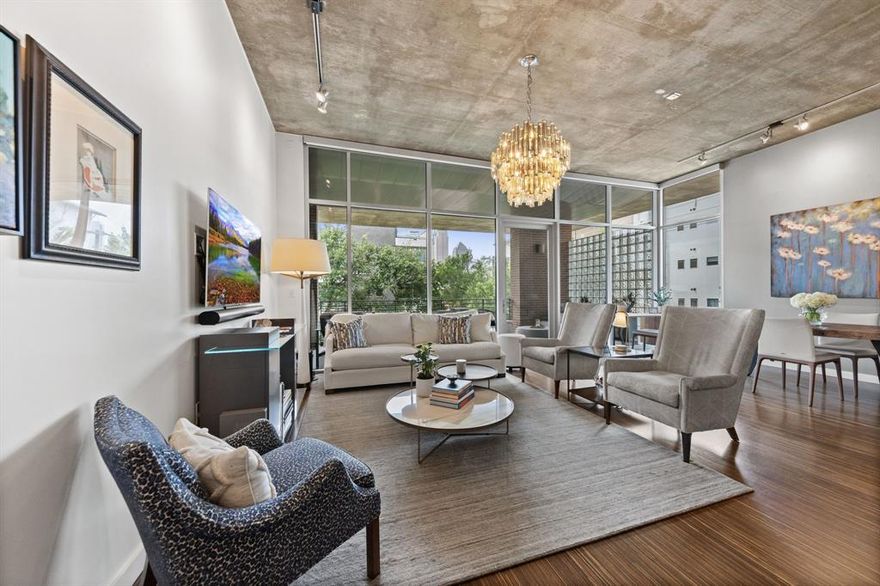 Nestled within Thirty Thirty Bryan — an exclusive enclave of just 37 residences — Soaring 11-foot ceilings, floor-to-ceiling windows, and premium finishes in this light-drenched 2 Bedroom, 2 Bath 1,731sq. ft. residence.
The open-concept great room flows effortlessly between living, dining, and a gourmet kitchen, The primary suite offers a true sanctuary: a spa-inspired bath with dual vanities, deep soaking tub, and generous walk-in closet. The second bedroom with ensuite bath adapts seamlessly to fully closable home office.
Step onto the private 200-square-foot balcony to take in the sculpture garden and pool views. Two heated underground parking spaces and a private 20×20 storage unit are private amenities.
Building amenities include a 55-foot saltwater pool, 2,000-square-foot rooftop with kitchen and 360 degrees panoramic views of the Dallas skyline and fitness studio. Moments from Baylor Medical Center, A&M School of Dentistry and Booker T. Washington High School for the Arts — yet worlds away from the ordinary.