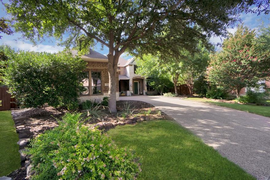 Fabulous custom home on almost half acre lot, pool and spa. Entertainers dream with all the elegant touches inside and out.  High ceilings and hand scraped hardwoods welcome upon entry.  Front living and dining guide you into kitchen and Main living area.  Views of the beautiful backyard enhance this living experience.  Gas Stove, kitchen island, granite, pull out cabinet drawers finished with an extended sink area with window view of backyard oasis.  Luxurious master and master bath are a retreat from the balance of the home.  Work from home in office also could be 5th bedroom with additional bdrm downstairs.  Sweeping staircase to upstairs landing for more living space, 2 combined bedrooms separated by full  bath, oversized 3rd bedroom and  media game room.  Use the abundance of storage space in home as well as garage.  Outside is amazing and private.  Huge covered patio surrounding by lush landscaping, and two large grassy areas.