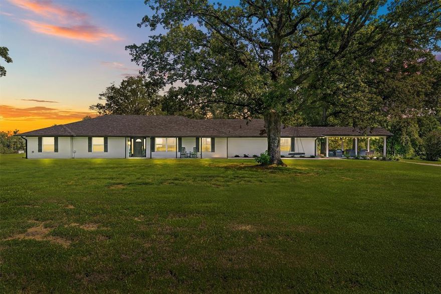 Set on 30.132 acres—80% of which is lush, open pasture—this beautifully remodeled 2023 farm and ranch property in Lindale offers both elegance and utility. The 4,343 sq ft residence boasts 4 spacious bedrooms, 4 full baths, and a rare 4-car garage, providing comfort and space for large families or guests. Inside, thoughtful updates blend modern finishes with timeless country charm, creating a home that’s as functional as it is inviting. Expansive living areas, a gourmet kitchen, and serene bedroom suites make it perfect for both entertaining and everyday living. Fenced and cross-fenced pastures, a barn, working pens, and wide-open grazing land make this a turn-key setup for livestock or equestrian pursuits.
