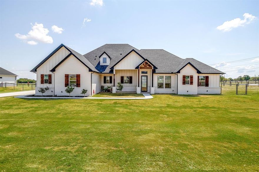 Welcome to 1000 Magnolia Court – A Springtown Gem with Space, Style, and Freedom (No HOA)! This better than new beautifully maintained home offers the perfect blend of charm and functionality. Step inside to discover stunning wood-look flooring that flows seamlessly throughout, creating a warm and inviting atmosphere. The open layout is light and bright, with an abundance of natural light that fills every room. You’ll love the spacious master suite, complete with a large en-suite bath featuring dual vanities and an oversized shower – your personal retreat after a long day. Hosting guests? There’s a private guest room with its own en-suite bath, ideal for family, visitors, or multi-generational living. Outside, the backyard is designed for both relaxation and practicality, featuring privacy fencing around the patio, a separate fenced dog area, and yes – chickens are allowed! It’s the perfect setup for enjoying country-style living without sacrificing comfort or convenience. Don't miss the 3-car garage with plenty of space for vehicles, tools, or hobbies that stays a comfortable temperature in the summer. Don’t miss this opportunity to enjoy the freedom of country living with modern comforts – schedule your tour of 1000 Magnolia Court today!