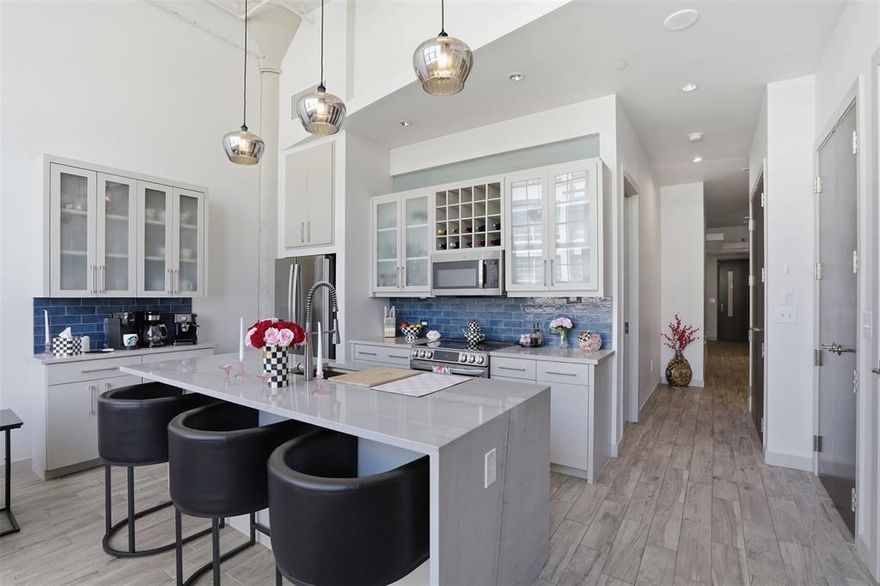 STUNNING NEW LISTING! All the bells and whistles! Perched high above the vibrant heart of Fort Worth’s coveted West 7th district, Montgomery Plaza #1707 offers an exceptional blend of modern luxury, convenience, and abundance of natural light. This sophisticated condo delivers an elevated lifestyle, where refined design meets effortless lock-and-leave living.

From the moment you enter, you’re greeted by contemporary tile and expansive floor-to-ceiling windows that flood the space with natural light. DREAM KITCHEN AWAITS! This kitchen has been fully renovated to include an entirely new layout, new cabinetry, new kitchen island, upgraded appliances, extended bar area with a wine fridge, icemaker and beautiful quartzite countertops. The open-concept layout is thoughtfully designed for both everyday living and entertaining, seamlessly connecting the living, dining, and kitchen areas into one cohesive space. The spacious primary suite serves as a private retreat with a spa-like ensuite bath. The bathroom has been completely remodeled to include new double vanity, tile flooring, enhanced storage, new lighting and upgraded extended shower with tile details and a custom closet. The secondary bedroom features new tile flooring, paint and lighting. The ensuite bathroom has new tile flooring, tub, wall tile, upgraded toilet, lighting, vanity and lighted mirror. The HVAC unit was replaced in 2024. Remodel was completed in 2024 

Residents of this premier high-rise enjoy access to a full suite of amenities, including a resort-style pool, state-of-the-art fitness center, resident lounge, 24-hour concierge, and secure parking. Just steps from your front door, West 7th’s premier dining, shopping, and entertainment destinations await, placing the best of Fort Worth at your fingertips. Perfectly positioned near downtown, the Cultural District, and Trinity Trails, this residence offers the ultimate lifestyle. Come join the fun!