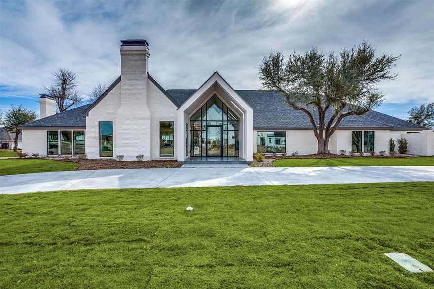 A modern transitional beauty! Taken to the studs, completely rebuilt. Over .5 acre and over 7,000 sq. ft., This 4 bedroom, and 5.5 bath home is one of a kind. Every part of this home is special, unique, and fabulous! Abundant natural light with The majority of the sq. footage down. Hardwood flooring and natural stone throughout. Large bedrooms with ensuite baths and walk-in closets. The large chef's kitchen includes amazing Italian appliances. A  wooden masterpiece house the refrigerator, freezer, and large walk-in pantry. Two fireplaces. The large master bedroom has the closet of your dreams!  Another room for an office, playroom, or exercise room. The large room upstairs has a media room and flex space. Large three-car garage with storage. The backyard features several patios. room for a pool, playground, or whatever your imagination creates! natural light, large spaces, abundant storage, and a fabulous location near schools, shopping, and great restaurants. Come see!