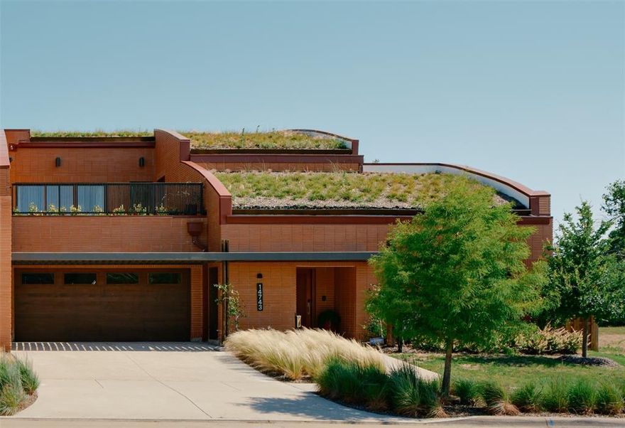 Experience a new way of luxury living. Introducing the V40: A custom-crafted, fully furnished* home where sustainability meets refined design. Under Construction, Estimated completion: Fall 2026.
Designed and built by the award-winning team at Total Environment, the V40 strikes a rare balance between beauty, sustainability, and everyday quality of life.
This home is anything but typical. Thoughtfully designed to connect you with nature, it features warm, natural finishes, floor-to-ceiling windows, and and grass terraces accessible from every room.
Built with sustainability in mind, this home features advanced geothermal HVAC, solar panels, a living grass roof, and passive cooling strategies. 
Material selections are timeless and elevated: white oak flooring, quartzite and marble countertops, custom built furniture, wood-framed windows, and natural clay brick cladding.
Located in Tapestry, a 56-acre master-planned community along Rowlett Creek, future amenities will include a clubhouse with café, fitness center, and pool, plus a central park, creeks, ponds, and walking trails.

Under construction: Renders are for show only, Photos are of the Model home. Actual materials and finishes will vary. 
*Can be purchased Furnished, or Unfurnished