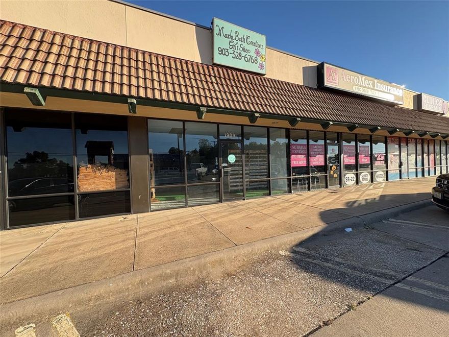 This property is located on a very busy corner at Grand Ave and Texoma Parkway.  There is a great mix of tenants in the building that help draw even more attention to the location.  The space is empty and ready for your business to move in.  Contact us today for more details and to schedule a showing!