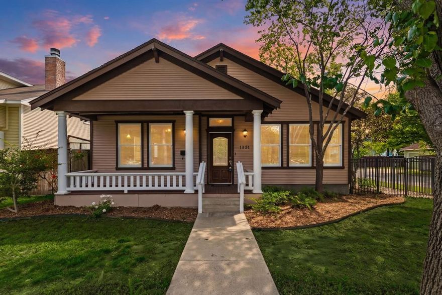 1331 6th Ave sits just steps from the vibrant West Magnolia district in Fort Worth’s historic Fairmount neighborhood, with roots dating back to the 1800s. Unlike many homes in the area, this newer build offers more manageable upkeep while honoring the historical requirements of Fairmount.
A standout feature is the detached garage with approximately 361 sqft of finished living space above, complete with a full bathroom that's well-suited for guests, a home office, or separate living quarters.
The main home features an inviting front porch and a layout filled with natural light from energy-efficient double-pane windows. The kitchen offers ample cabinetry, black granite countertops, a five-burner gas range with skillet, and stainless steel appliances. Built-in storage is abundant throughout, and a gas log fireplace anchors the main living area.
The primary suite is split from the secondary bedrooms and includes a jetted tub, separate shower, and a large walk-in closet. Outside, a wood fence encloses the flagstone patio to create a more private, low-maintenance space with room to enjoy without heavy upkeep.
If you're searching for a newer home with historic charm and fantastic walkability to shops and restaurants, then your search ends here!