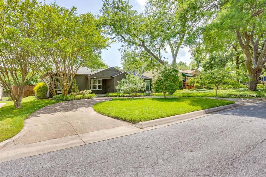 Charming and well-maintained 3-bedroom, 2-bath home with updates already done for you! From the moment you walk in, you'll notice the beautiful wood floors and updated kitchen and bathroom cabinets paired with stylish stone countertops that give the home a fresh, modern feel. Plantation shutters throughout add a classic touch and great natural light. Step outside and enjoy the spacious wrap-around deck—perfect for relaxing, entertaining, or weekend cookouts. The backyard is nicely landscaped with lush grass. Sprinkler system in both the front and back yards makes keeping it looking great easy. You'll also love the bonus room that offers endless possibilities—home office, playroom, workout space, or hobby room. The HVAC system is only 2 years old and blown-in attic insulation helps keep utility costs down. Home features an installed security system. Located close to shopping, dining, and everyday conveniences with easy access to I-30, this home offers both comfort and convenience. Move-in ready and full of charm, this is the kind of home that just feels good the moment you walk in. This is a must see!
