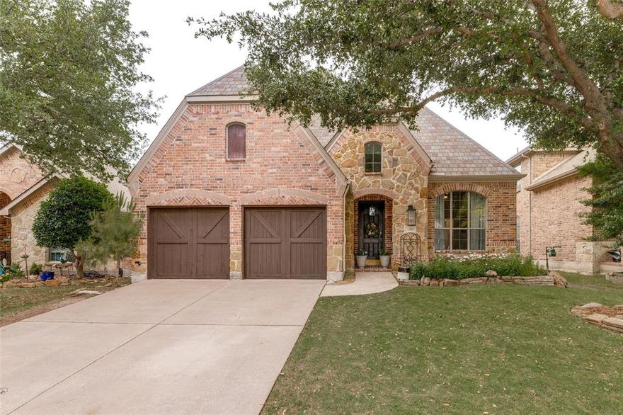 Experience executive-style living in the highly sought-after Aspendale community of McKinney, where luxury finishes, resort-style amenities, & an unbeatable location come together in this stunning 4-bedroom home. Extensively upgraded & renovated in 2025, showcasing fresh interior & exterior paint, high-end luxury vinyl plank flooring throughout, solid white oak stair railings, designer tile in baths and utility areas, updated lighting, soaring ceilings, crown moulding & elegant arched architectural details that create a refined yet welcoming atmosphere. The open-concept floorplan is designed for both entertaining & everyday living. The chef-inspired kitchen features custom cabinetry with upgraded hardware, thick granite countertops, a large center island with undermount sink, built-in stainless appliances including a gas cooktop & butler’s pantry. The luxurious primary suite has been completely transformed into a spa-like retreat featuring a freestanding soaking tub, frameless glass shower with designer tile, & upscale finishes throughout. Upstairs offers exceptional flexibility with a large gameroom currently utilized as a home office, two fully remodeled secondary baths, & spacious secondary bedrooms including one with a private ensuite bath. Step outside to your own private backyard oasis complete with extended cobblestone outdoor living space & beautifully landscaped surroundings perfect for relaxing or entertaining. Residents of Aspendale enjoy premium HOA amenities including a resort-style pool, fishing pond, tennis courts, parks, playgrounds, greenbelts, & miles of hike and bike trails. Located within the acclaimed Frisco ISD, known for top-tier academics & extracurricular programs. Convenient access to Sam Rayburn Tollway & U.S. Route 75 places you near major employers including Toyota Motor North America, JPMorgan Chase, & Raytheon, along with upscale shopping & dining at Stonebriar Centre & The Star. This is the one-schedule your private tour today!