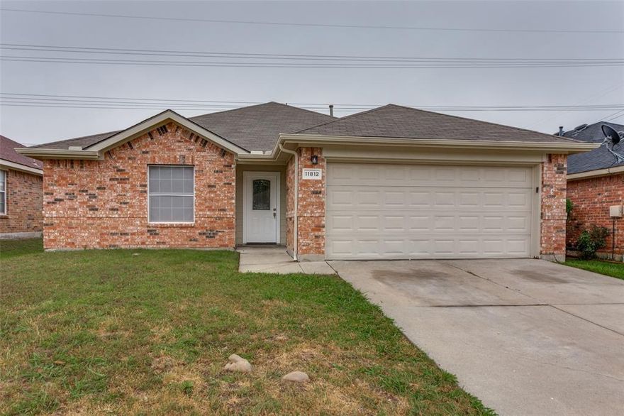 Move in ready 4 bedroom, 2 bath brick home in North Fort Worth's highly sought after Keller ISD! Vaulted ceilings and abundant natural light welcome you into an open living area anchored by a classic tile surround fireplace. The beautifully updated kitchen features gray shaker cabinets with matte black hardware, light granite countertops, a stone mosaic backsplash, and stainless steel appliances including a slide in range and built in microwave. Luxury wood look tile flooring flows throughout the main areas. The split bedroom floor plan offers privacy, while the 2 car garage and handsome brick exterior deliver lasting curb appeal. Located minutes from I-35W, Alliance Town Center, and top-rated Keller ISD campuses, this home checks every box. Don't miss your chance to own in one of DFW's fastest growing corridors!