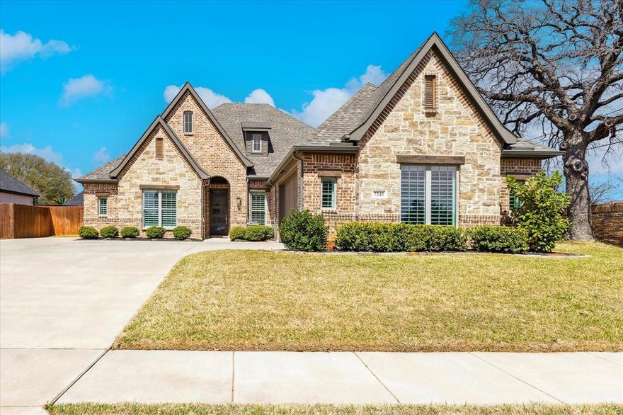 This pristine, gently lived-in, single-owner, custom-built home offers the perfect blend of luxury, comfort, and functionality. The open floor plan seamlessly connects the kitchen, dining area, and living room, creating an inviting and warm place for gatherings. The fabulous kitchen complete with  the always popular gas cooktop, quartz countertops, a California island, double ovens, a microwave, ample cabinets, and a walk-in pantry. The Bosch refrigerator can convey if desired. This home features three bedrooms, each with walk-in closets. The spacious primary suite includes a spa-like en-suite bathroom with dual sinks, a soaking tub, and a separate shower. A versatile office space with French doors provides a quiet and productive environment, ideal for remote work. The completely private backyard features a gorgeous custom Claffey pool and heated spa, a covered patio with a mounted TV that will convey and gas fireplace. Other things to love in this yard are the Ooni pizza oven, built-in grill and the level backyard with grass offering ample room for pets or children to play outside. Additional features include a garage with epoxy floors and high end plantation shutters throughout. Located within walking distance to the 100+ acre Cross Timbers Park which offers ballfields, playground, picnic shelters, and hiking and bike trails. Much of the park's acreage is a dedicated preserve that is home to a variety of birds and wildlife. Buyer and buyers agent please verify all schools, taxes and measurements. Survey is for informational purposes only, buyer will have to buy a new survey.