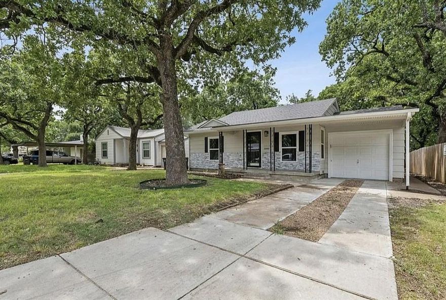 Welcome to your fully remodeled oasis! This stunning 3-bedroom, 3-bathroom home has been meticulously updated from top to bottom. Step inside and discover a fresh, modern interior featuring new flooring, paint, cabinetry, light fixtures, and beautifully tiled showers. Every detail has been thoughtfully considered to create a bright and inviting living space. NEXT TO SCHOOLS AND HANDLEY PARK!

But the upgrades don't stop there. The spacious backyard hosts a fantastic guest house (additional 660 sqft), perfect for in-laws, a home office, or extra rental income. The guest house includes its own new AC unit, light fixtures, flooring, a full bathroom, a closet, and a convenient kitchenette.

Commuting is a breeze with quick access to Highway 820. Located within the sought-after Fort Worth ISD school district, this home offers both comfort and convenience. Don't miss your chance to own this exceptional property!

TENANT OCCUPIED - Main house on Lease till 6-30-2026 at $2,200mo - Guest House on Lease till 8-31-2026 at $875mo