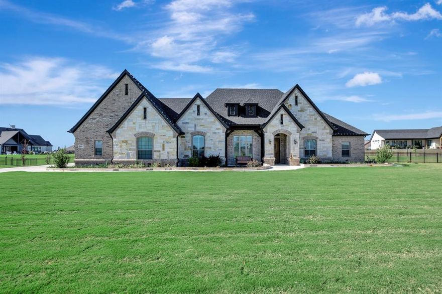 Discover exceptional country-style living on a full 1-acre property located in highly desirable Northlake, Texas!  This nearly new custom home offers the perfect blend of comfort, elegance and functionality with 4 bedroom, 3 full bathrooms, a formal living room, open concept family room, and dedicated office - perfect for remote work or a quiet study.

Designed for those who love to cook and entertain, the chef's kitchen features high-end finishes and appliances, abundant storage, a huge walk in pantry, and a spacious layout that flows seamlessly into into the main living areas.  The private primary suite is a true retreat, highlighted by a huge walk-in closet, massive walk-in shower with two entrances and a grand clawfoot bathtub.  Secondary bedrooms are generously sized and thoughtfully situation for comfort and privacy.  The plantation shutters that adorn the windows throughout add timeless charm and excellent light control. 

Car enthusiasts or hobbyists will appreciate the 4-car garage with epoxy floors that offer plenty of room for vehicles, tools or additional storage.  The garage includes a climate controlled closet, perfect for food storage or a large wine cellar.  The expansive backyard provides endless possibilities - pool, garden, play area or build an outdoor oasis.  There is plenty of space to build your dream outdoor lifestyle. 

Located in a peaceful, upscale area with convenient access to dining, shopping and major commuter routes, this property delivers the best of Northlake living!