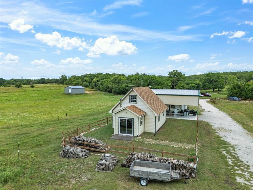 Nestled in the heart of nature, this cozy country cottage offers a peaceful retreat on 17.43 acres of picturesque land. A meandering creek adds to the serenity, while lush pastures make it ideal for livestock. Enjoy the convenience of covered RV parking (water, sewer, and 50amp hook up) and a separate shed(20x25) for storage or projects. The thoughtfully designed septic system is ready to accommodate a larger home, giving you the flexibility to expand in the future. Whether you're seeking a tranquil getaway or a foundation for your dream homestead, this property is full of possibility.