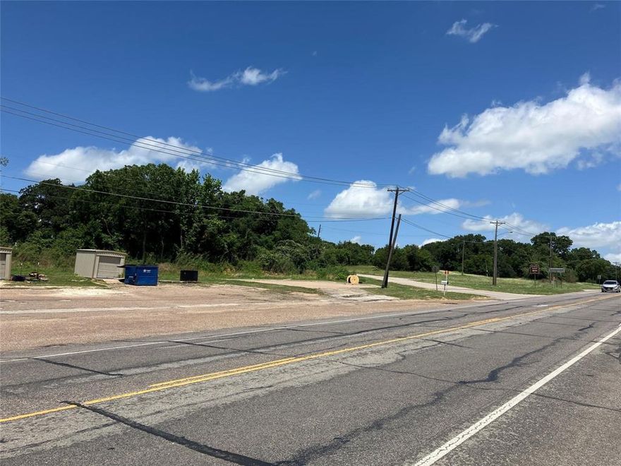 On a corner lot, Property is zoned commercial. Additional lot next door if needed. All utilities are on property. This property is the northern half of Property ID R000008209 approximately .28 acres. Ready for your business.