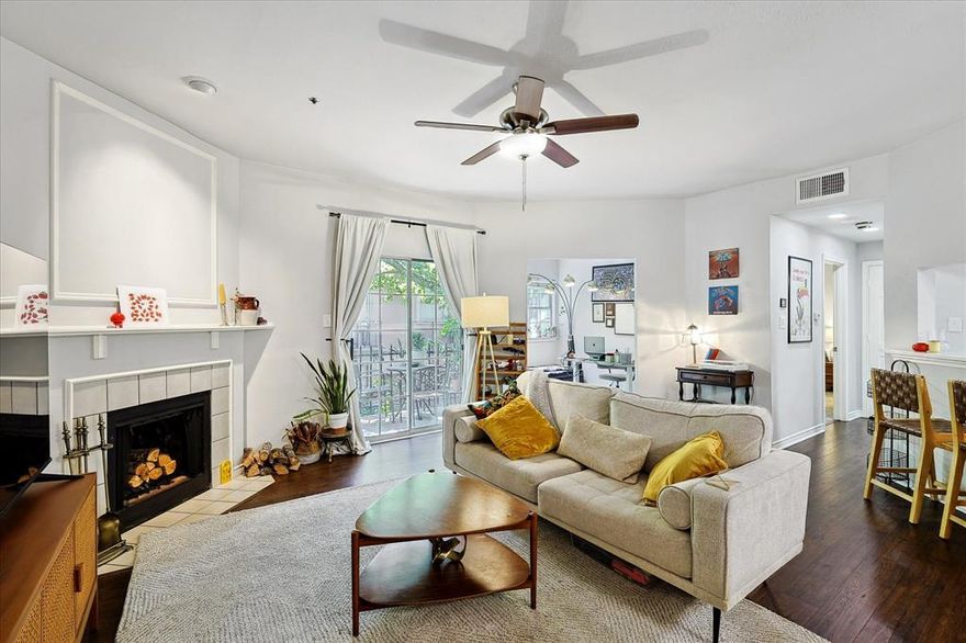 Experience the charm of this updated one-bedroom plus study condo in the private, gated Bryan Place V community. The home features stainless steel appliances, modern lighting, refinished cabinets, and fresh carpet. An open floor plan connects the living room, kitchen, and dining area, highlighted by newly installed hardwood floors and a functional wood-burning fireplace.

The spacious primary bedroom offers a large vanity with a second sink, a generous walk-in closet, and an updated bathroom. The study is perfect for a home office or a flexible guest room.

Enjoy in-unit laundry, two assigned garage parking spots, and a quiet street with secure gated entry. Within walking distance of Exall Park and Meadows Dog Park and just minutes from Downtown, Deep Ellum, and Greenville, this condo combines comfort, convenience, and an ideal location in the heart of Dallas.