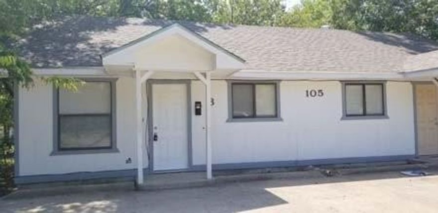 2 bedroom 1 bath duplex with central AC, electric range and built-in microwave