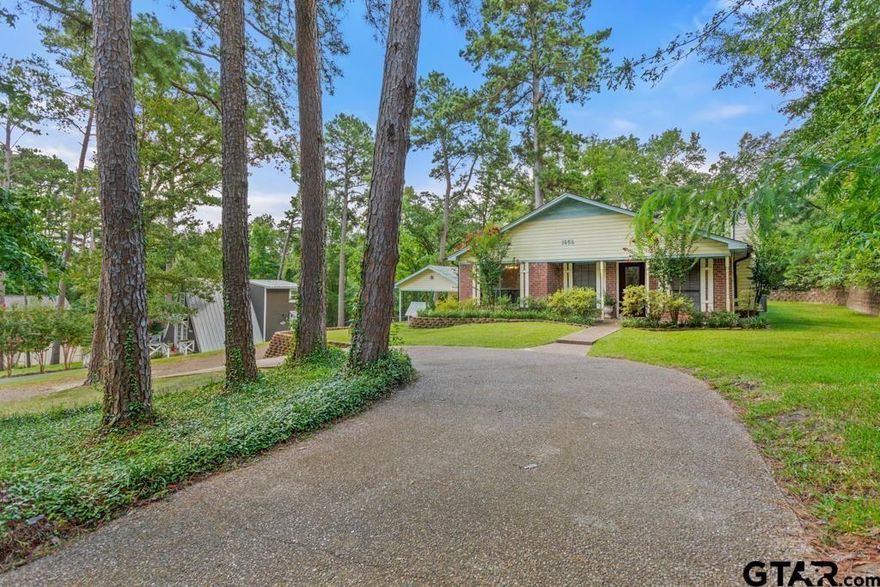 Just freshly painted the majority of the entire of this home with light and bright color scheme! Ready for a switch to a peaceful lifestyle in the highly sought after Hideaway Lake Club? This three bedroom, two bath home with screen porch and two car carport on a quiet side street in Hideaway may be just the change you're looking for! This home is set back in the pine trees in the north-west side of the Hideaway community near the back gate for easy access to Lindale via FM16. Built in 1986 you'll find larger bedrooms and a fully dedicated dining area to be very comfortable in this 1903 sq ft floor plan. Large open living area with a wood burning fireplace. Well appointed kitchen with pantry. In the rear of the home you'll find a nice screen porch accompanying the second and third bedrooms. Beside the home you'll find the two car carport, additional storage area at the rear of the carport and additional outbuilding directly behind. Just off the carport is a side walkup onto the deck running to the rear of the home and immediate kitchen door access coming up from the carport. Hideaway is a lake and golf community and large HOA with 27 holes of golf, pro shop, two recreation lakes, community pools and a bar and grill amongst the manyamenities of the HOA. It's also a part of the wonderful award winning Lindale Independent School District.