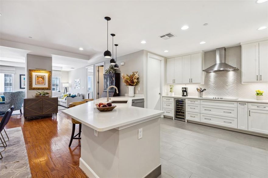 Discover the epitome of urban living in this elegantly updated condo in the heart of Downtown Dallas. Arrive to on-site valet and 24-7 concierge in this boutique high rise originally built as the Dallas Savings & Loan building. Enter to a light & bright open-concept floorplan w-warm wood floors, museum finish walls & stunning views of the Thompson Hotel pool. The spacious gourmet kitchen features premium appliances, custom cabinets, wine cooler, pantry & ample counter space w-under cabinet lighting. Enjoy living spaces w-stylish fireplace & custom media wall creating the perfect versatility for entertaining or relaxing. Primary suite has large window & spa-like bath w-jetted tub & huge walk-in closet. Enjoy large 2nd bedroom plus 3rd currently used as office. Don’t miss the 9x7 storage closet in the hall & the multitude of amenities including recently updated fitness center, theater, 5th level rooftop deck w-pool & pet relief area, game room & wine vault. Truly a one-of-a-kind hi rise!