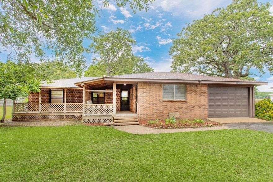 Discover the charm and potential of this well-maintained home located in a peaceful rural setting, just under 15 minutes from Athens, TX. Enjoy the best of both worlds, country living with convenient access to shopping, dining, and other city amenities. This inviting property features original hardwood floors, a spacious living room, and a bright sunroom perfect for relaxing or entertaining. The home sits on a generous 0.5-acre lot dotted with mature trees, offering plenty of space to enjoy the outdoors. Additional features include a private water well, septic system, and attached garage. A large carport in the back provides ideal storage for an RV, boat, or additional vehicles. There's also a detached workshop, great for hobbies, storage, or DIY projects. The covered front porch adds to the home’s welcoming appeal, making it a great place to unwind. Whether you're looking for a primary residence, weekend getaway, or investment opportunity, this property offers flexibility and value in a serene location with quick access to town. Don’t miss your chance to own this versatile home in East Texas!