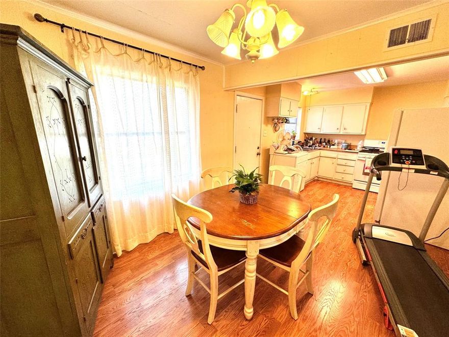 Welcome to this charming mid-century modern bungalow in East Dallas. With its unaltered character, this vintage gem invites you to embrace the authenticity of a home that has stood the test of time. The Barbie pink brick and classic pier and beam foundation set the tone for this timeless home. Original hardwood flooring throughout most of the home offers a nostalgic charm with every creaky step. With it's untouched originality, this sweet home offers a blank canvas for your vision and a chance to own a piece of mid-century history. This home is being sold AS IS. No showings until under contract.