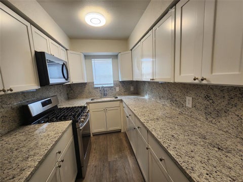 Photo of 2404 Louise Street #4, Denton, TX 76201 (MLS # 21372877)