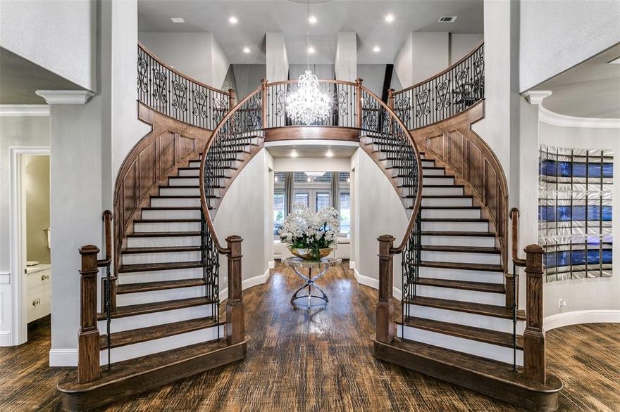 Meticulously maintained custom home in coveted Double Oak neighborhood on 1 acre! A grand entry with dual staircases ushers you into this stunning home where you will find 5 bedrooms, 4.5 baths, formal living and dining areas just off the entry, 2 executive study spaces, upstairs media, game room with wet bar, and 4-car garage with porte-cochere! Second bedroom on 1st floor with full bath! Upgrades and amenities include hand-scraped hardwoods throughout main living areas, plantation shutters, vaulted beam family room ceilings, Juliet balcony, an expansive wall of windows in the family room looking out onto the covered patio with retractable screens, spacious primary retreat with luxurious bath, and MORE! Chef's island kitchen boasts bright white cabinetry, commercial grade gas range with double ovens, and built-in Electrolux fridge. Incredible outdoor living space is perfect for year-round entertaining, complete with a sparkling pool, attached spa, and cozy cabana with outdoor kitchen!