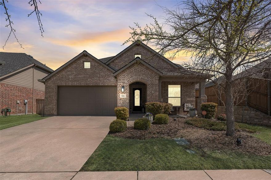 Welcome to 4136 Winslow Drive in Celina, located in the highly desirable Light Farms community and zoned to Prosper ISD!! This beautiful home offers 4 spacious bedrooms, 3 full bathrooms, and a generously sized second floor bonus room. With 2 bedrooms and 2 full bathrooms downstairs, the layout is both functional and flexible.  The open concept living space is warm and inviting, featuring a lovely family room with a stone fireplace, a large dining area, and a beautifully updated kitchen. You will love the stainless steel appliances, gas cooktop, granite countertops, oversized center island with ample seating, and abundant cabinet storage.  Step outside to your oversized covered patio with plenty of space for relaxing and grilling, plus an added stone fire pit that is perfect for making s’mores and enjoying evenings outdoors.
This home is light, bright, and move in ready! Light Farms is known for its unique blend of small town charm and modern amenities, with extensive green space, pools, trails, parks, and an onsite café!
Come on out and see this lovely home and make it yours!