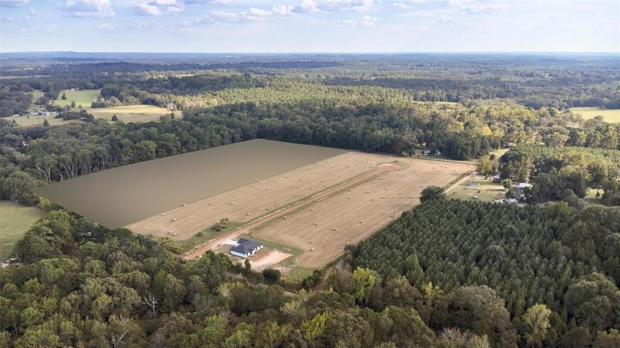 Serenity Cove offers a rare opportunity in Gilmer, Texas, with 21 half-acre lots designed for new, affordable construction. Please take advantage of USDA loans with 0% down payment and explore our move-in-ready model home! LOT 11 is a standout half-acre property, ready for your custom-built, modern farmhouse-style luxury home. Our trusted local builder will construct a beautiful 1,633 sq ft floor plan featuring 3 bedrooms, 2 bathrooms, and an open-concept layout perfect for contemporary living. Energy-efficient construction, high-quality materials, and stylish finishes are standard, and buyers can personalize select features before construction begins. Additional customization costs will be added to the base price of $324,285. To start, secure your lot with a $1,000 earnest money deposit upon contract. The builder will then commence construction in accordance with the approved floor plan. See attached photos and PDFs for detailed floor plans. Enjoy the benefits of Gladewater ISD and a location less than 15 minutes from downtown Gilmer, with convenient access to US HWY 155, HWY 271, HWY 300, and HWY 154. Gilmer, in Upshur County, is known for its rich history, the annual East Texas Yamboree, Lake Gilmer, and its vibrant downtown! Note: Lot 11 is currently undeveloped. Pricing, floor plans, and design options are subject to change based on buyer selections and final agreement. Photos depict the lot only; no structures are present on the property.

Currently, the home is not built so that you can show the land & city-approved building plans. Your client can also select other lots if they prefer a different plan or color palette. Twenty-one lot options are available & since the home is not built, you can select the land & city-approved building plans. Your client can also choose a different plan or color pallets on all lots on the left. All right-side lots have city-approved plans assigned, but color changes & additions can be made if needed.