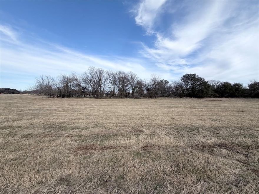 This 1-acre lot within the city limits of Whitney is mostly open with a backdrop of large mature trees, offering privacy and natural beauty. Located in the gated Lakewood Acres subdivision with City water, underground electric, and a chip sealed private road. Deed restrictions align with City of Whitney rules. A peaceful homesite close to town with abundant wildlife.
