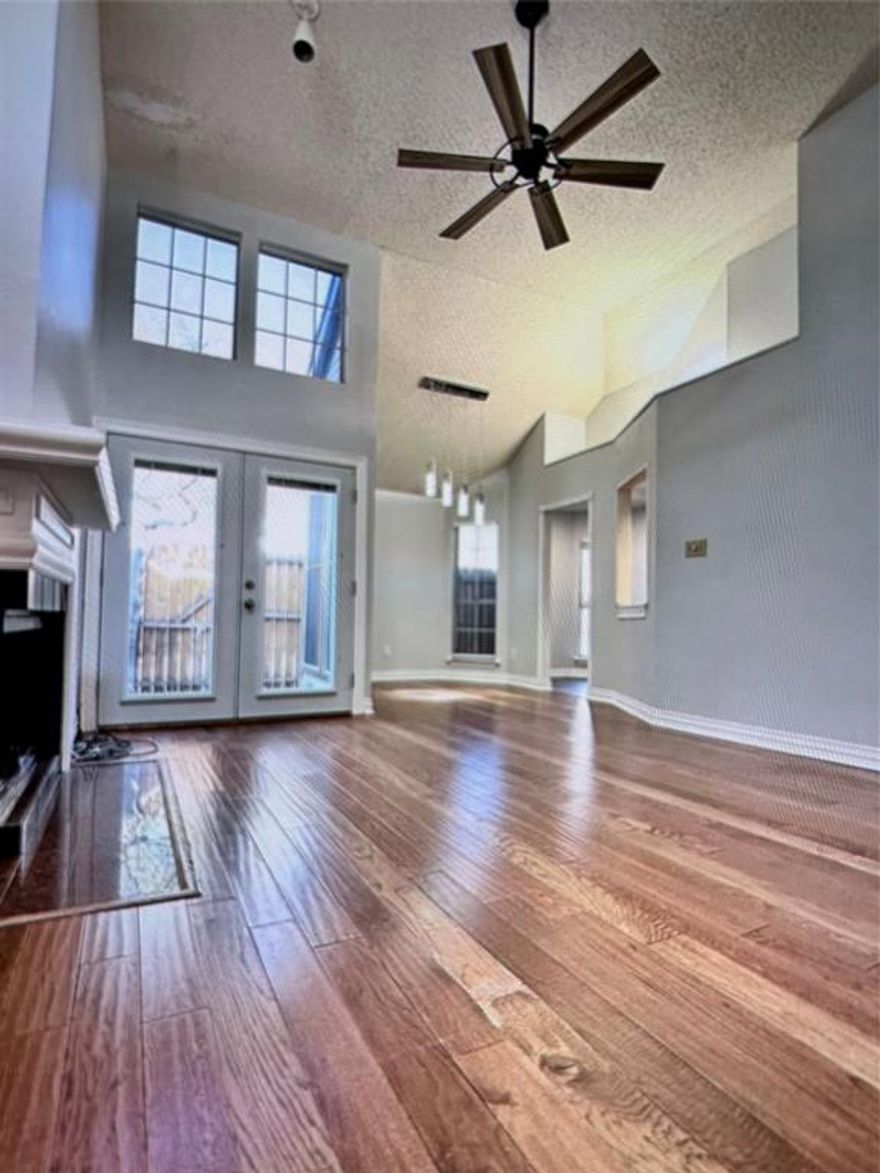 Victorian-style cottage home with attached single-car garage in the desirable Gables on Royal Lane. Vaulted ceilings in many rooms create an airy, open feel and make the home live larger than its square footage. The living and dining areas are bright and open, showcasing vinyl plank flooring, vaulted ceilings in the living room with oversized windows and two patios! Located just minutes from I-35 and the Tollway, short distance to both airports (DFW and Love Field), Addison shops and night life. Low $97 per month HOA covers common area landscaping and exterior in this single-family home community, including brick fence maintenance.