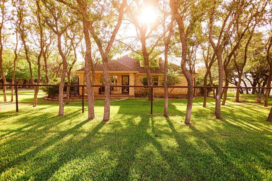 Tucked beneath a canopy of mature oak trees, 310 County Rd. 611 in beautiful Oak Ridge Estates, Brownwood, TX  feels like a peaceful escape within a short distance to the water! This inviting 3-bedroom, 2-bath home sits on 1.92 oak-covered acres surrounded by nature, offering the perfect mix of comfort, space, and serenity. Inside, an open concept layout welcomes you with two spacious living areas one ideal for a family room or game room perfect for gatherings and entertaining. The primary suite and second bedroom are located on the main floor, while upstairs you’ll find a third bedroom, full bath, and two versatile flex spaces that can serve as extra bedrooms, an office, or a private retreat. Step outside and fall in love with the setting towering oak trees, multiple sitting areas, and plenty of room to relax or host guests. A two car garage, RV or boat carport, four storage buildings, and a greenhouse provide abundant space for hobbies and equipment. Wildlife and birds visit daily, adding to the quiet charm of this property.Whether you’re looking for a full-time home, weekend getaway, or lake-area retreat, this one-of-a-kind property offers it all  tranquil views, space to breathe, and a touch of rustic elegance near Lake Brownwood! This residence was custom built by the sell and has been exceptionally well cared for. Only occupied by the seller!!!