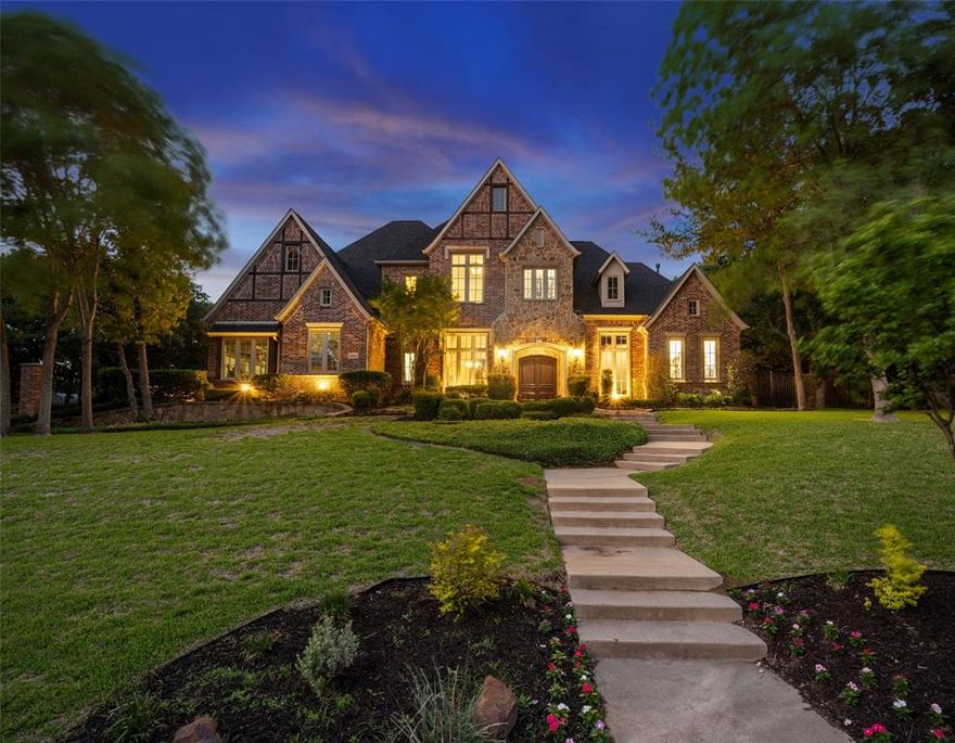 Rare, hard to find private estate home on 1+ acre in Carroll ISD! Walking through the entry you will see tons of mature trees, lush landscaping & gorgeous Claffey pool with water features. Remodeled kitchen with Sub-Zero and Wolf appliances with a huge island open to breakfast nook & family room that overlooks a private backyard. Great open floor plan allows for flexible furniture layout and large gatherings. Hardwood floors downstairs and up, plantation shutters, temperature controlled wine cellar, gated motor court with 4 car garage are just a few of the amenities showcased. Remodeled master bath feels spa-like with a huge walk-in shower and plenty of closet space! Master & guest down and 3 en suite's up.