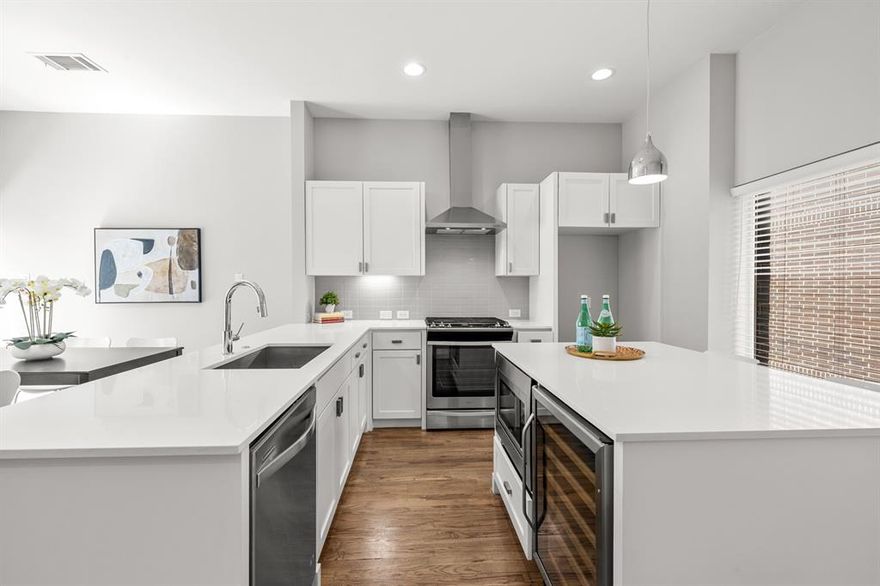 Perfectly situated in East Dallas, just minutes from Lower Greenville, Knox-Henderson and more, this stunning three-level townhome combines modern design with everyday comfort. Thoughtful updates enhance every space, from hardwood floors and quartz countertops to recessed and under-cabinet lighting that create a sleek, sophisticated ambiance. The chef’s kitchen boasts stainless steel appliances—including a built-in microwave and wine fridge—and flows seamlessly into the open living and dining areas, making it ideal for entertaining. Step outside onto your private balcony, the perfect setting for morning coffee or a glass of wine on a cool evening. Upstairs, the primary suite offers a serene retreat with generous sized ensuite bath and a spacious walk-in closet, customized to ensure generous storage. An attached two car garage provided security and additional storage. The low monthly HOA covers water, sewer, gas, and trash, keeping city living both effortless and enjoyable. With dining, shopping, and entertainment just steps away, this townhome offers the very best of Dallas living. Welcome home!