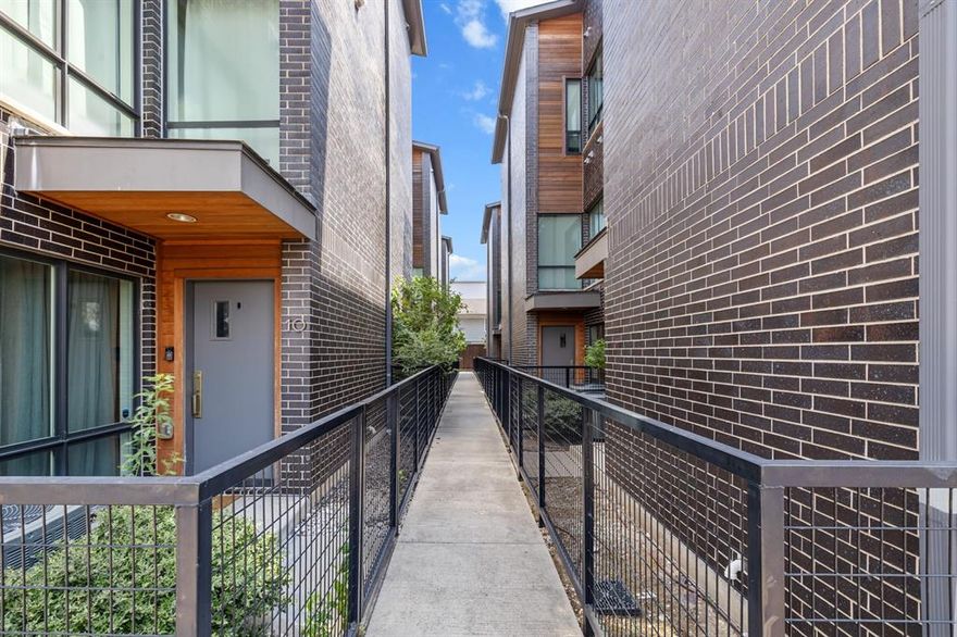 Perfectly situated in East Dallas, just minutes from Lower Greenville, Knox-Henderson and more, this stunning three-level townhome combines modern design with everyday comfort. Thoughtful updates enhance every space, from hardwood floors and quartz countertops to recessed and under-cabinet lighting that create a sleek, sophisticated ambiance. The chef’s kitchen boasts stainless steel appliances—including a built-in microwave and wine fridge—and flows seamlessly into the open living and dining areas, making it ideal for entertaining. Step outside onto your private balcony, the perfect setting for morning coffee or a glass of wine on a cool evening. Upstairs, the primary suite offers a serene retreat with generous sized ensuite bath and a spacious walk-in closet, customized to ensure generous storage. An attached two car garage provided security and additional storage. The low monthly HOA covers water, sewer, gas, and trash, keeping city living both effortless and enjoyable. With dining, shopping, and entertainment just steps away, this townhome offers the very best of Dallas living. Welcome home!