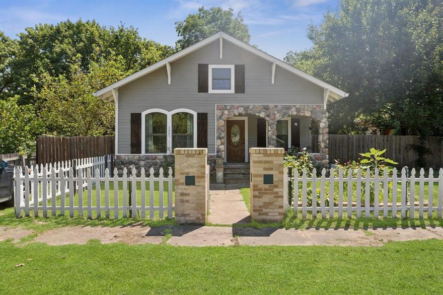 Charming Craftsman Home in Sherman – Full of Character and Updates! Welcome to this adorable three-bedroom, one-bathroom Craftsman-style home, beautifully framed by a classic wooden picket fence that offers a warm welcome to every guest. Ideally located in Sherman with easy access to Highway 75 and Highway 82, this home combines timeless charm with modern upgrades. Step onto the expansive, stone-covered front porch—perfect for relaxing mornings or evening chats. Inside, you’ll find a spacious living room highlighted by rich wood floors and a stunning accent stone wall that adds warmth and character. The well-maintained interior features thoughtful improvements throughout, including new electrical wiring, an upgraded bathroom countertop, a newly installed dishwasher, and new windows for enhanced efficiency and natural light. The kitchen is equipped with a gas cooktop and oven, white painted cabinetry, and plenty of prep space. The primary bedroom is generously sized, and both guest bedrooms offer flexibility for family, guests, or a home office. The bathroom features a garden tub, tile floors, framed mirror, and the new upgraded countertop. Additional recent upgrades include a new roof in 2025 and leaf guard gutters, giving you peace of mind and low maintenance for years to come. Out back, enjoy a large fenced yard—ideal for pets, play, or gardening—along with a storage shed, storm cellar, and a chicken coop that stays with the home. This cute and cozy home is move-in ready—you’re going to love it!