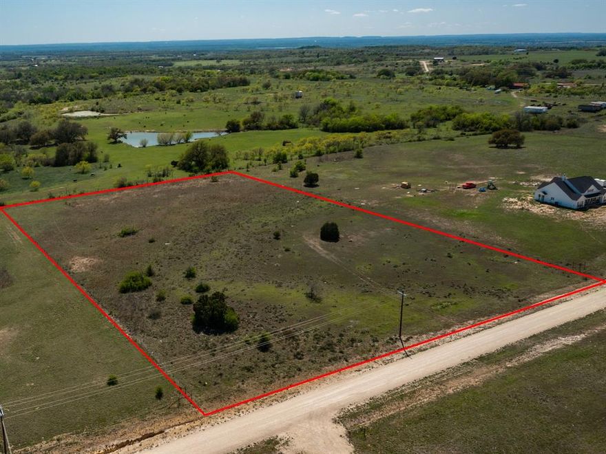 True possibilities are best appreciated in person; so, if you're looking for an affordable AND attractive place to build a home, drive by this one! This 5-acre tract in the peaceful Ranches at Deer Crossing offers privacy, wonderful views - just 9 minutes from Highway 377 in Dublin and 14 minutes from Lake Proctor. Priced to sell, this raw land features minimal preparation needed for a homesite and is fenced on three sides. This is the perfect spot atop a hill to see the beautiful sunrises and colorful sunsets. Plus, you'll find abundant wildlife roaming throughout the area like birds, deer and turkey. The property welcomes 4-H projects, gardens, a swimming pool, barn, and workshop but prohibits mobile homes. Whether you're looking for a weekend retreat or a forever homestead, this tract offers country living with the convenience of nearby town access. It's much prettier in person - take a drive to check it out!