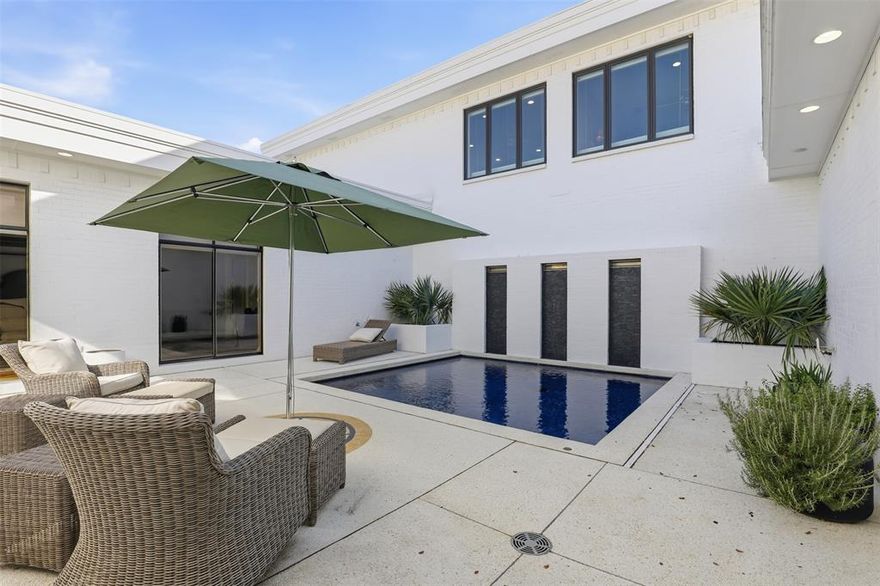 Discover a rare opportunity to own an exceptional piece of modern Fort Worth real estate. Never before listed in MLS, this striking 4,700-square-foot residence blends crisp contemporary design with an inviting retro flair. With generously proportioned rooms, thoughtful architectural details, and outstanding indoor-outdoor flow, 5625 El Campo is a property you won’t want to miss.

This home features 2 bedrooms, 2 full baths, and 3 half baths, with the flexibility to transform the spacious upstairs great room into a third bedroom, private office, or additional living area. The possibilities are endless. Upon entering, you are welcomed by an impressive 23-foot foyer that leads to a sunken bar—an ideal setting for entertaining. Whether hosting dinner in the expansive dining area or relaxing in the oversized living room, the home’s layout offers seamless spaces for gatherings of any size.

The downstairs primary suite serves as a luxurious retreat, complete with wood flooring, abundant natural light, and two large closets offering exceptional storage. The spa-inspired primary bathroom opens directly onto the private pool deck, creating a serene and seamless connection to the outdoors.

The kitchen is thoughtfully designed with contemporary cabinetry, stylish lighting, a gas range, and extensive storage that will satisfy any culinary enthusiast. Upstairs, guests are treated to their own private haven. Separate from the primary suite, the upper level includes a generous guest bedroom, an office area, and a versatile TV-office space that overlooks the sparkling pool—perfect for visitors seeking both comfort and privacy.

This distinctive home combines architectural character, modern amenities, and exceptional livability, making it a standout opportunity in one of Fort Worth’s most desirable areas.