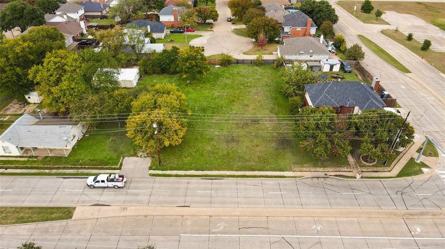 The property is being sold as a lot.  Just re-zoned November 4, 2025 to COMMERCIAL - NEIGHBORHOOD SERVICES.  See attached conceptual drawings in Transactions File. It is 0.84 acre with utilities available that is two minutes to the George Bush Turnpike.  An ideal site for a commercial building upon re-zoning.  According to the TxDot website 9,288 cars per day.